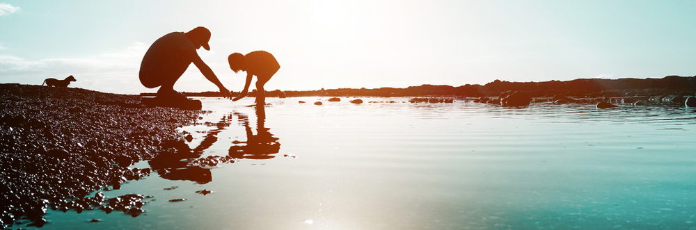 Man and boy by sea